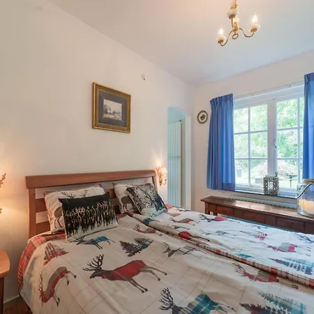 Mc Ghil Prázdninový dům *