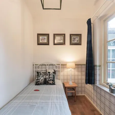 Mc Ghil Prázdninový dům